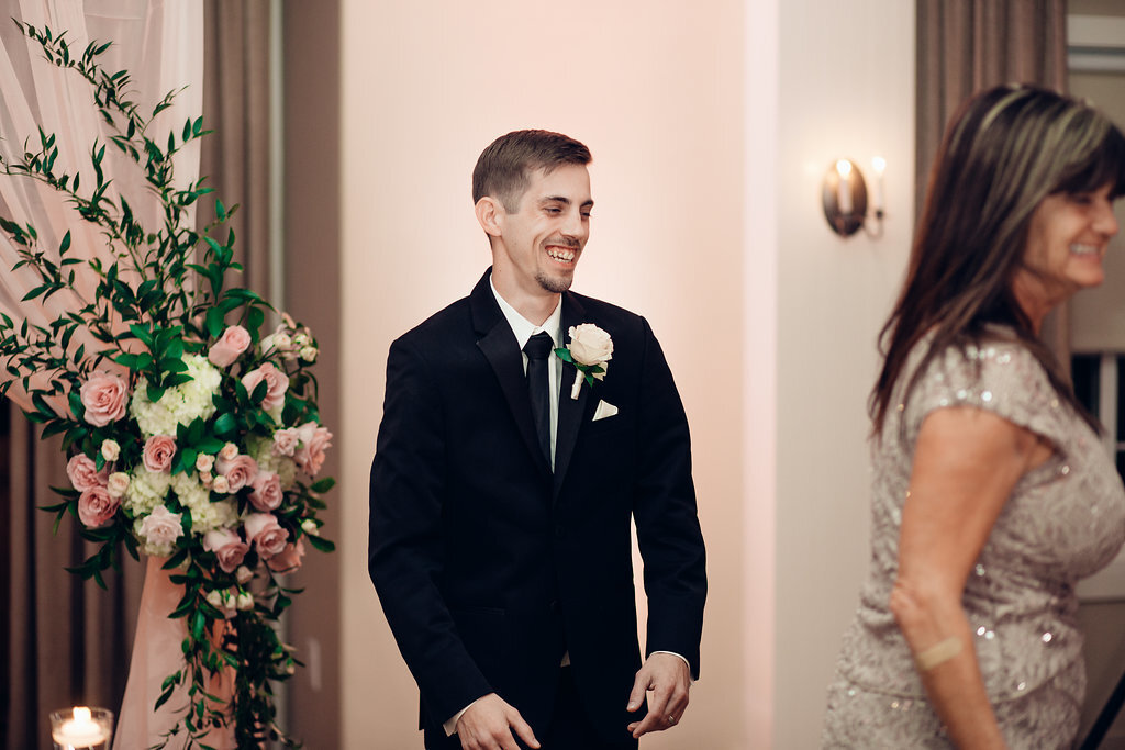 Wedding Photograph Of Groom In Black Suit Smiling Los Angeles