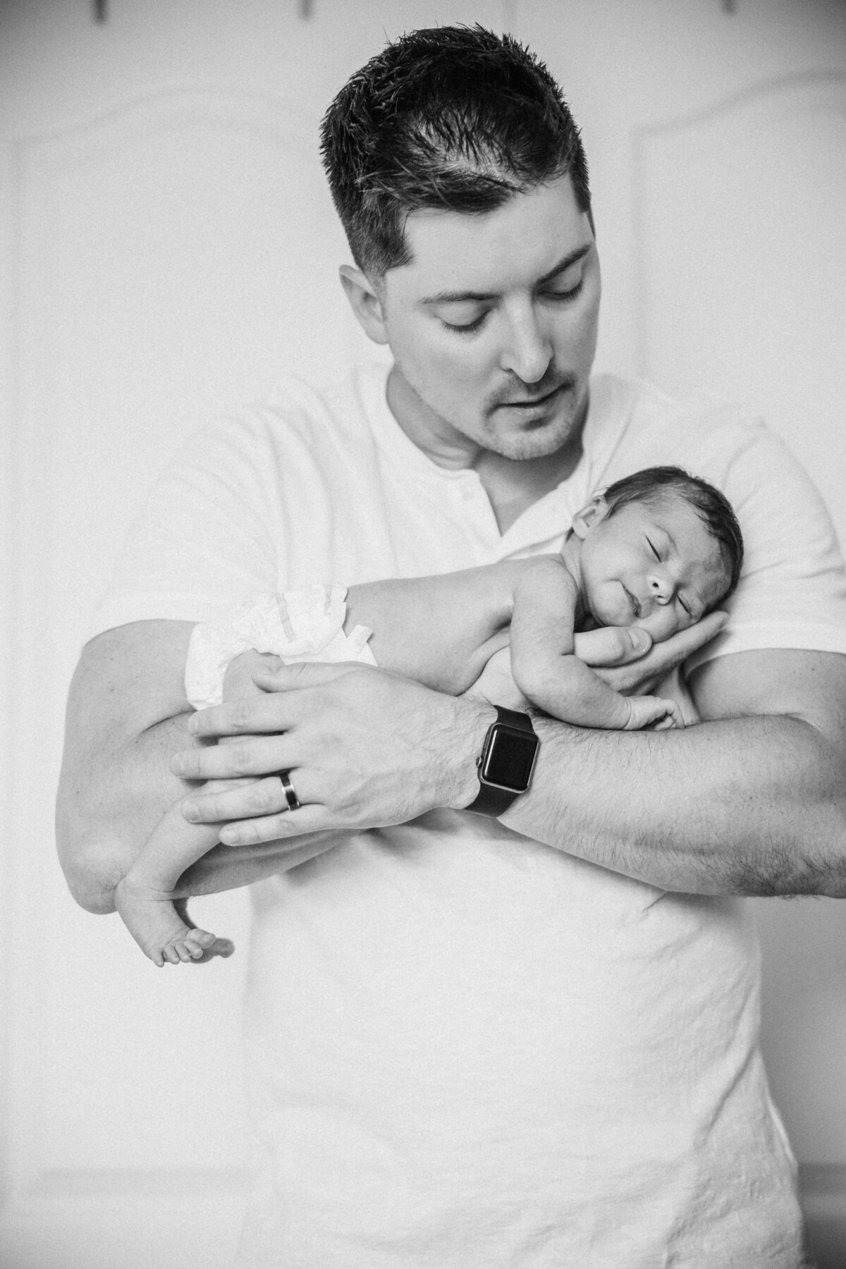 black and white of dad and baby