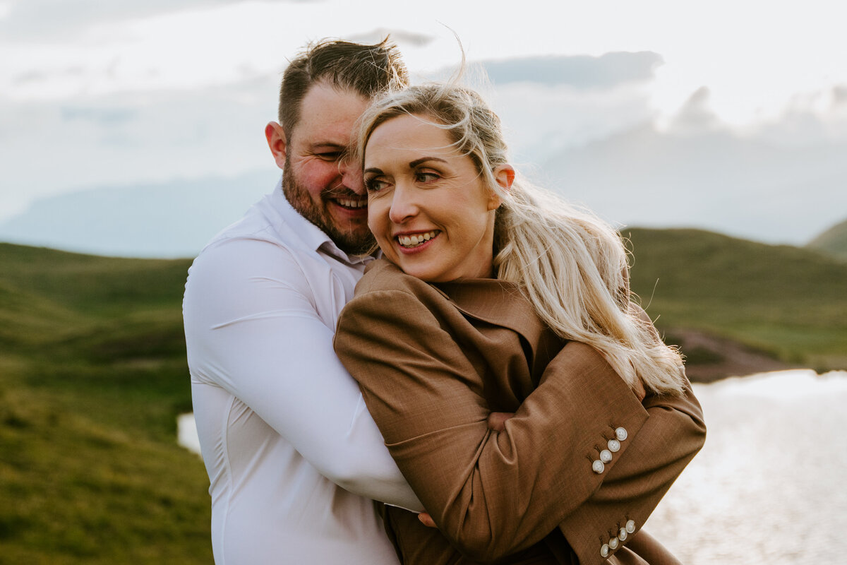 Close embrace during Dolomites elopement at golden hou