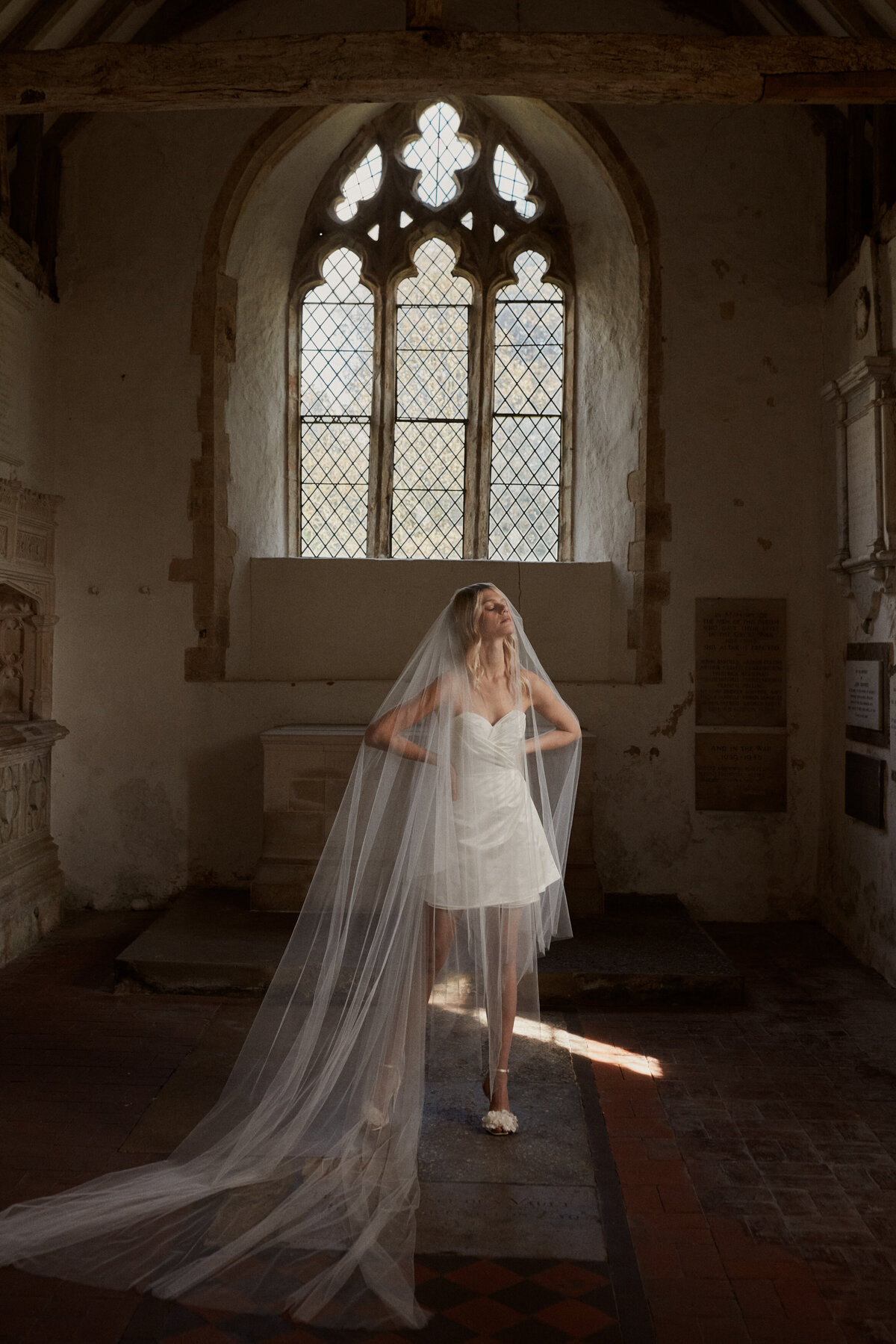 Benjamin Wheeler photography of bride wearing handmade mini silk wrap wedding dress