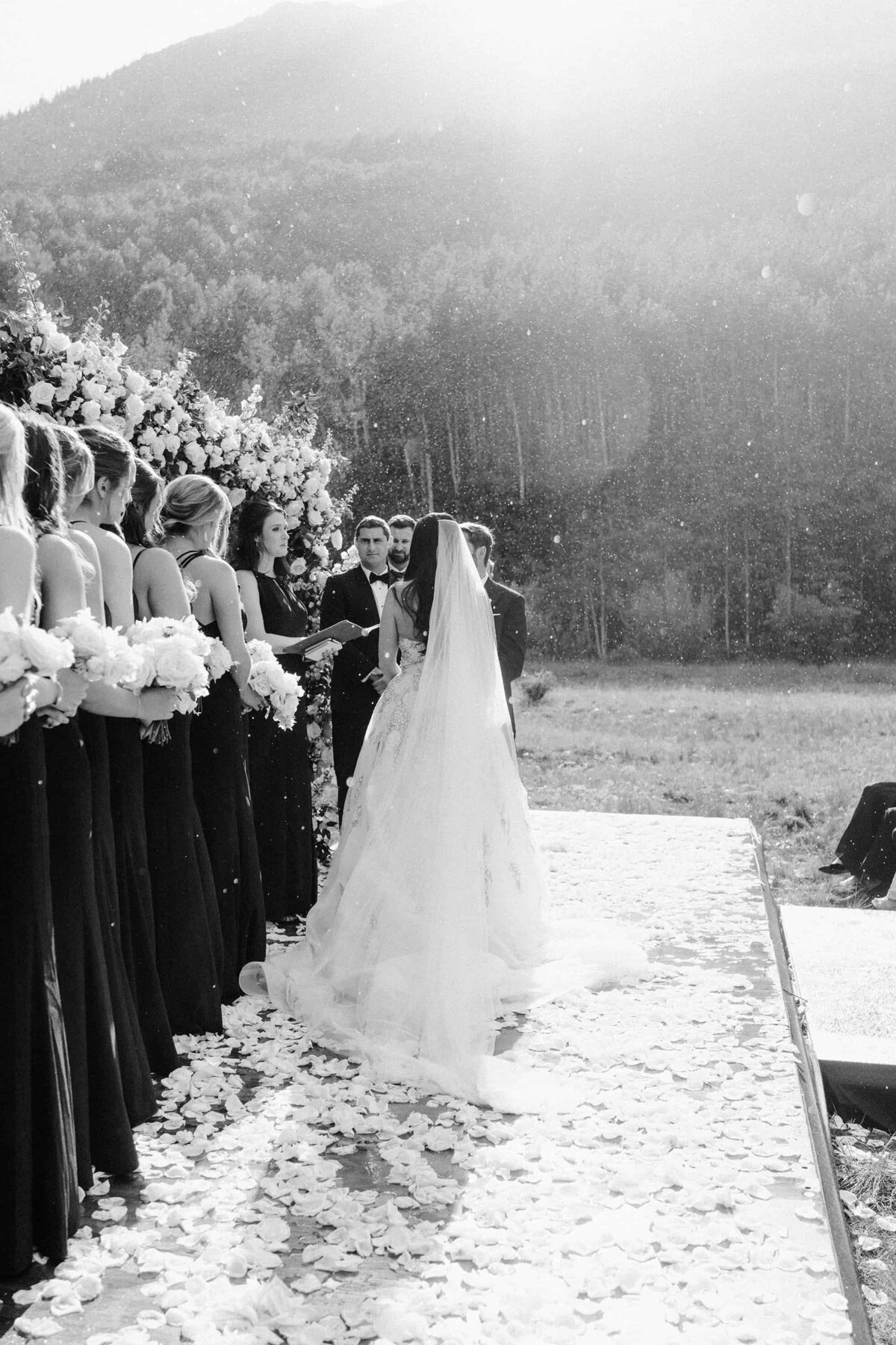Black and white photo of a bride at the altar Aspen Colorado