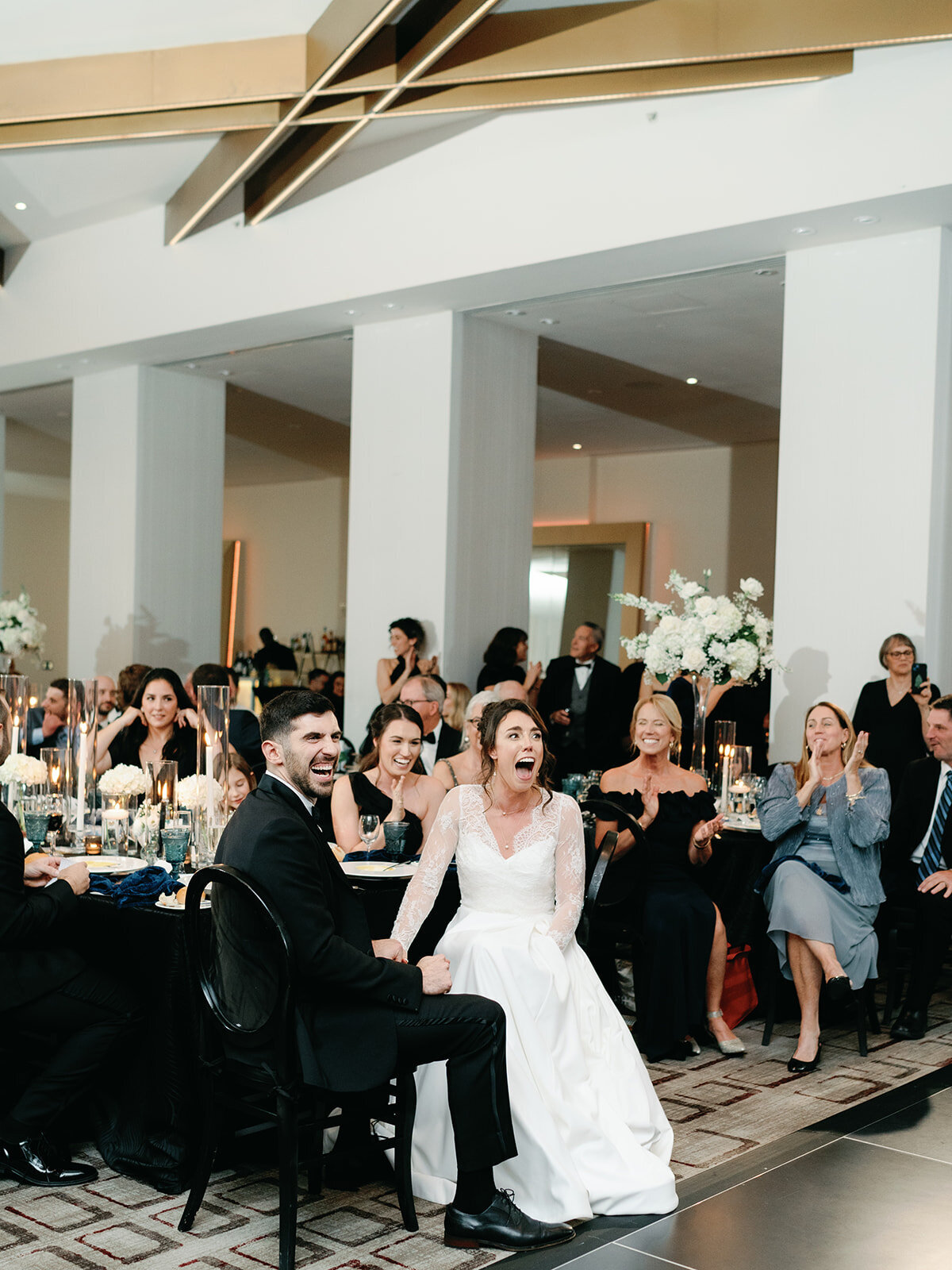 Bride and groom surprised at their wedding reception at Hotel Washington 