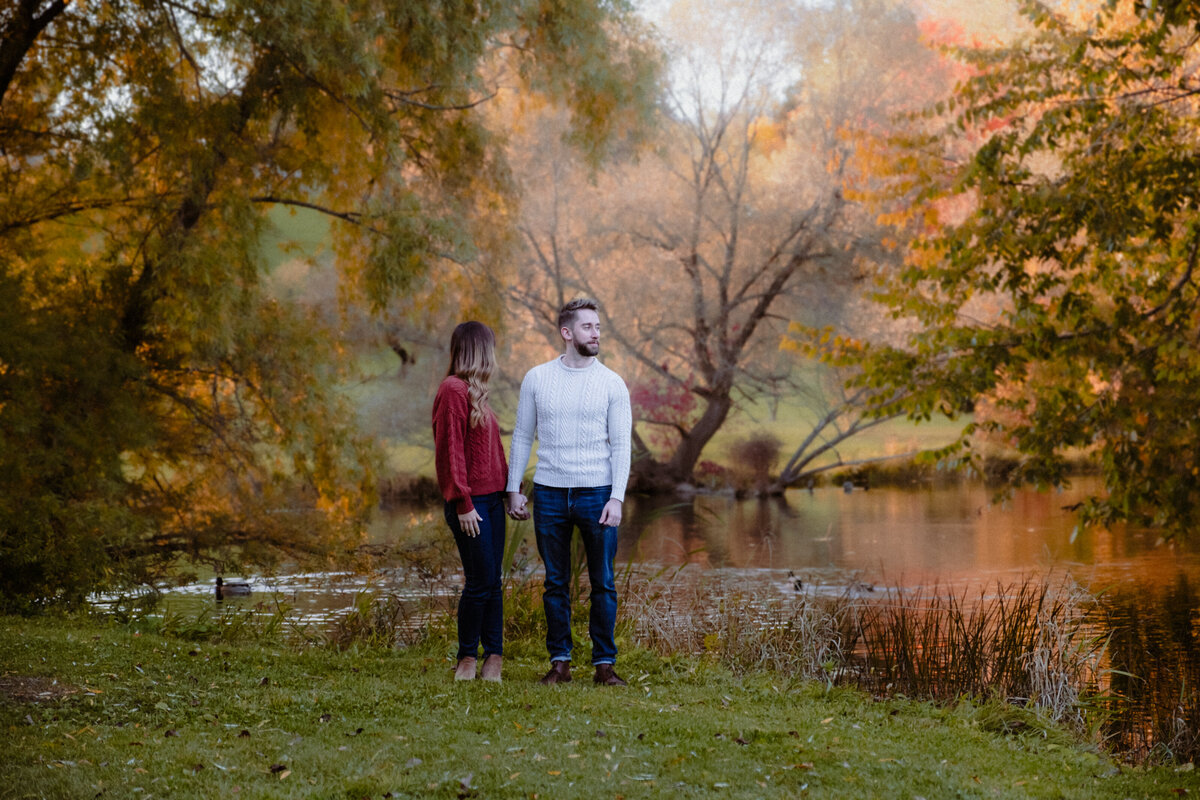 engaged-couple-by-the-foggy-water-on-heart-island-in-ottawa-1