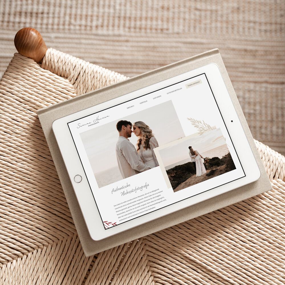 iPad mockup of an elegant, fine-art wedding photographer website
