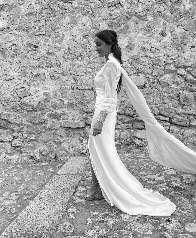 The bride walking with an amazing dress