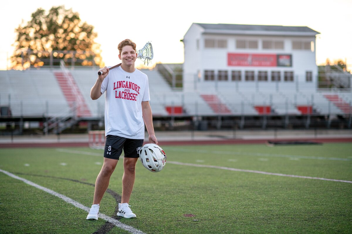 lacrosse player on high school field