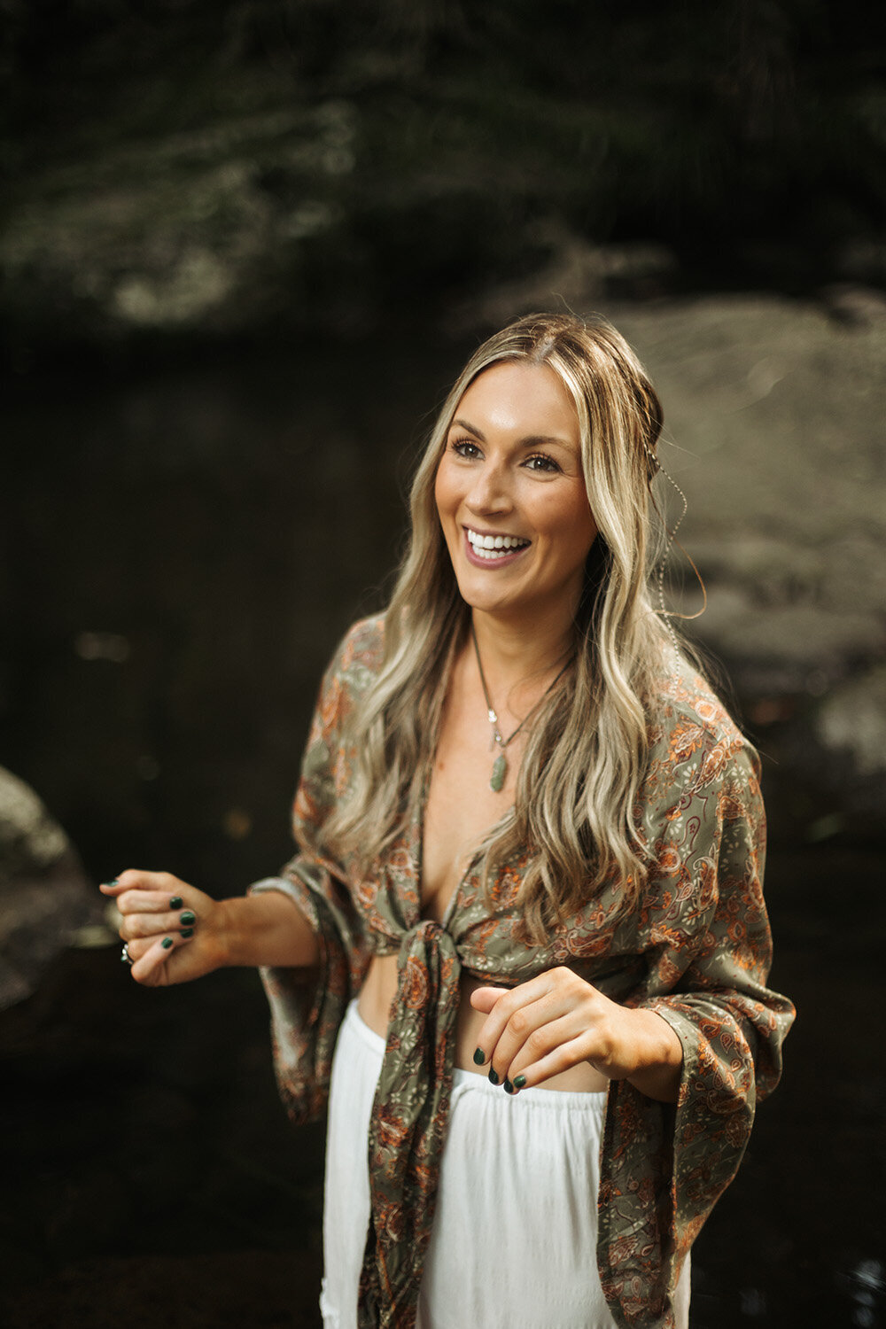 Holistic branding photography for a wellness coach, captured in a serene, nature-inspired setting. 