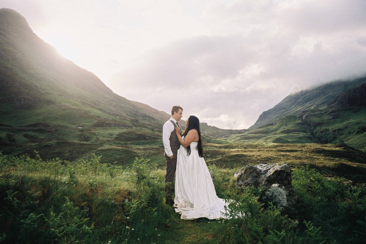 A 35mm film photograph of a couple wearing wedding attire in Glencoe.