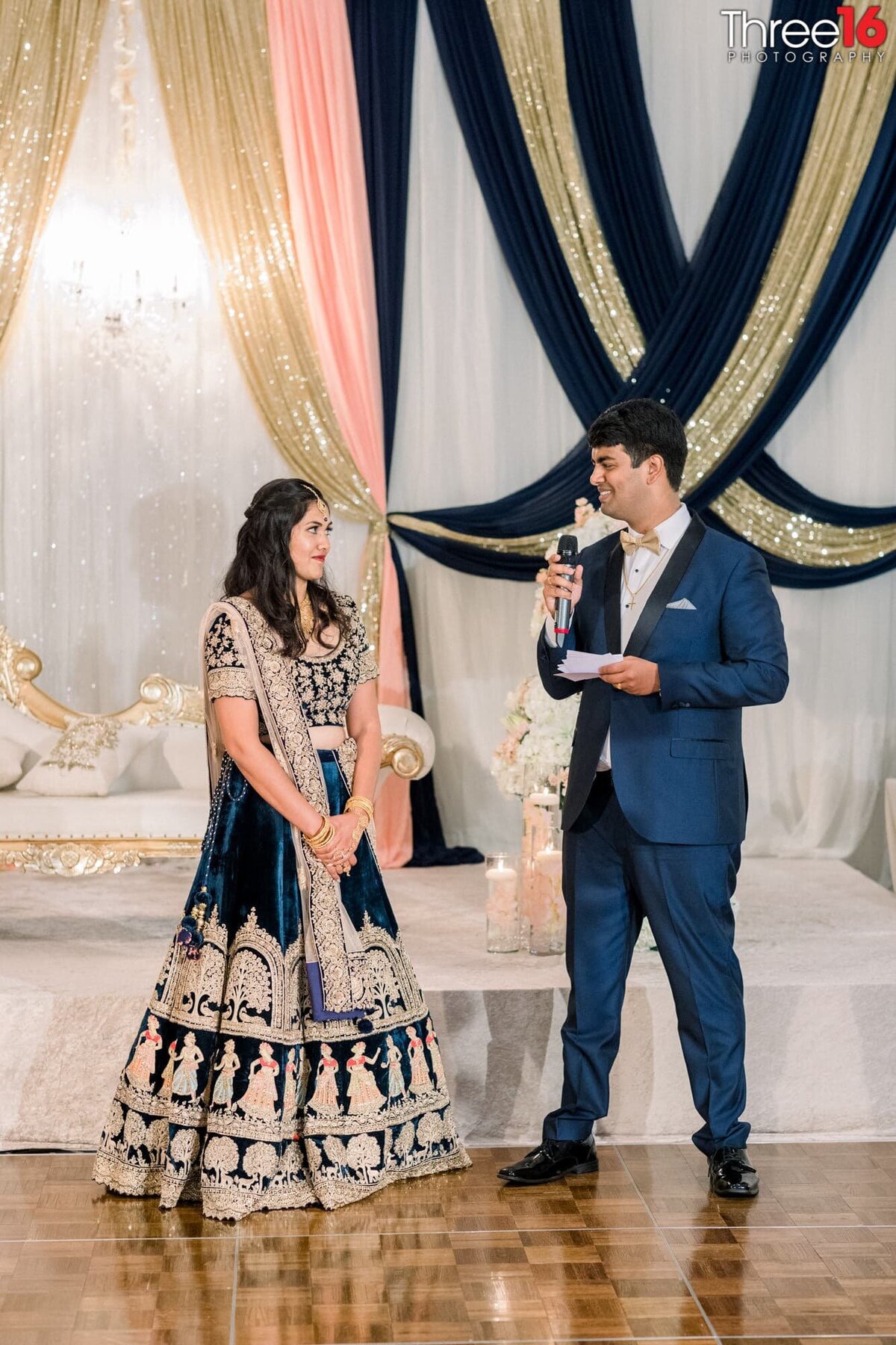 Groom salutes his Bride during the wedding reception