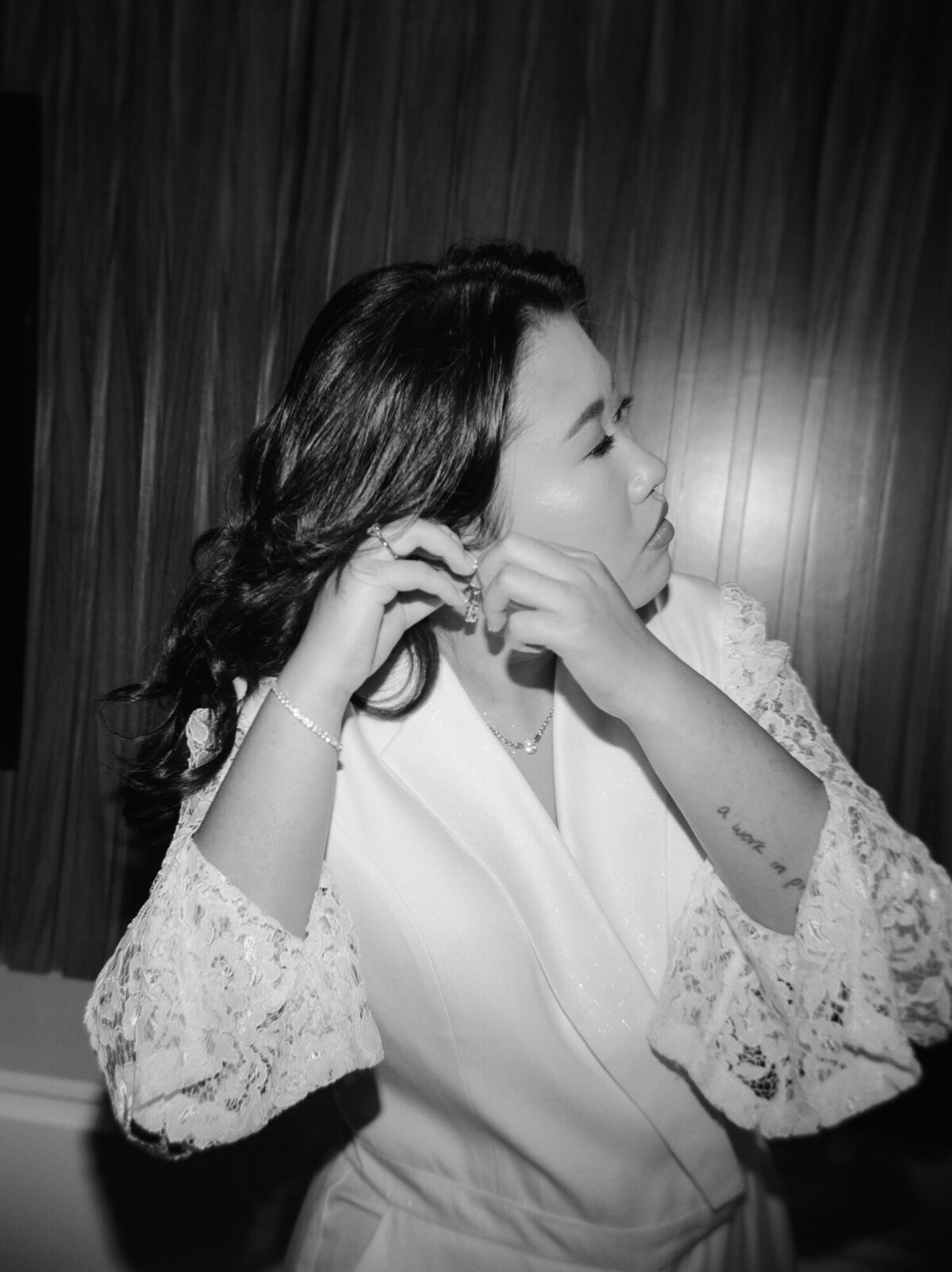 asian bride with tattoo and chic pantsuit, lace sleeves, Mexico resort wedding
