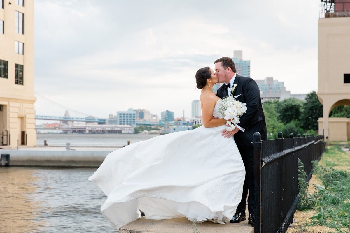 bride's gown blowing in the wind in philadelphia