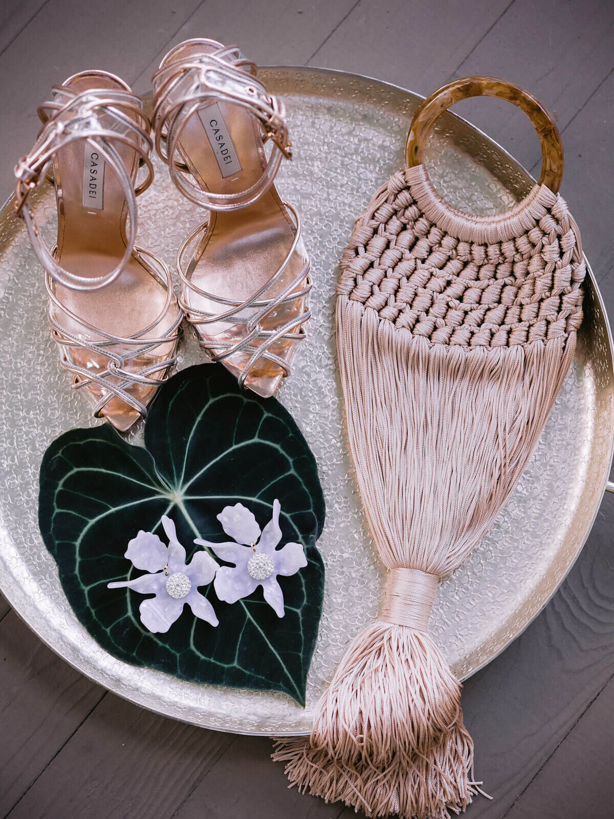 The bride's beautiful gold sandals in Montage at Palmetto Bluff. Destination wedding image by Jenny Fu Studio