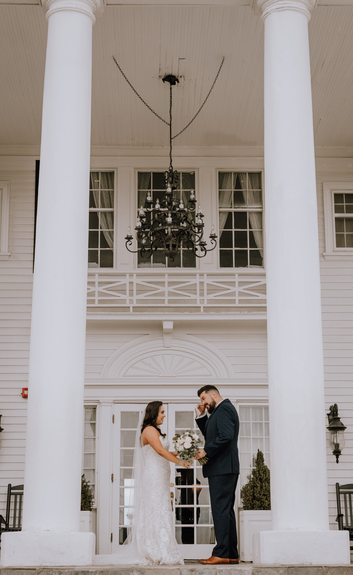 bride and groom celebrating at manor house