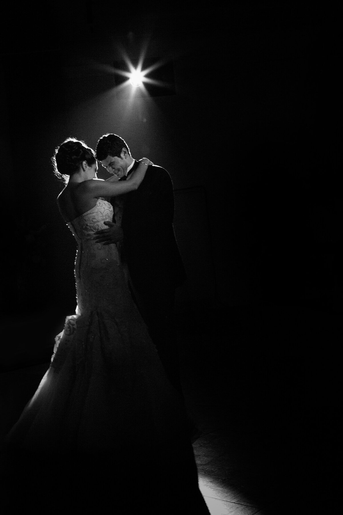 bride and groom dancing