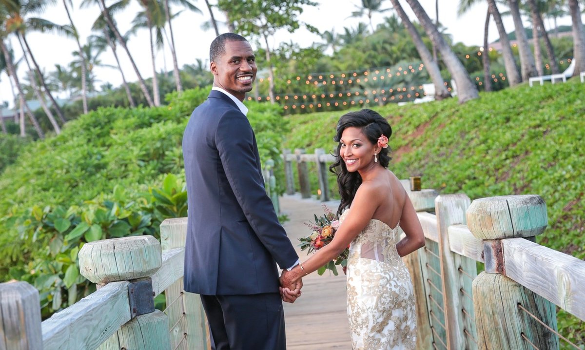 Maui Wedding Photography at The Andaz Maui Wailea of the bride and groom on the bridge