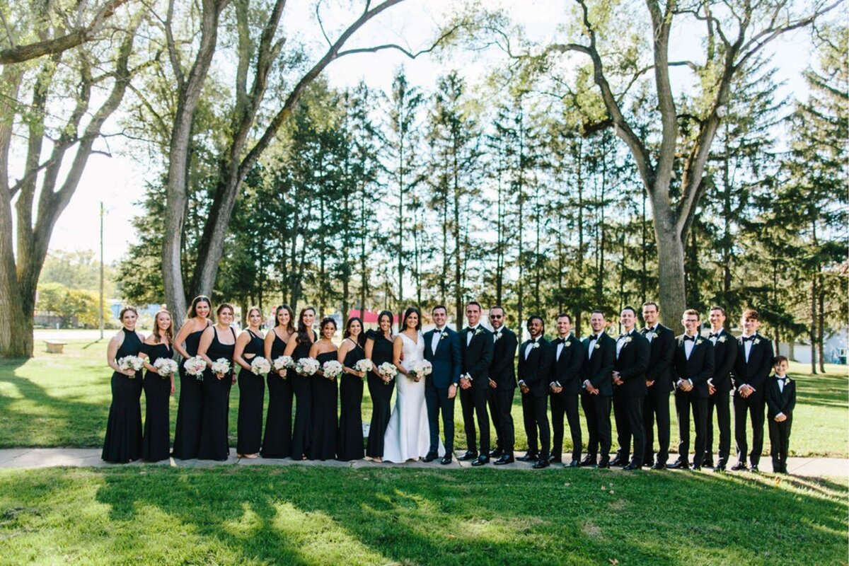 Timeless and Elegant Wedding Party Portrait at a Luxury Michigan Lakefront Golf Club Wedding.