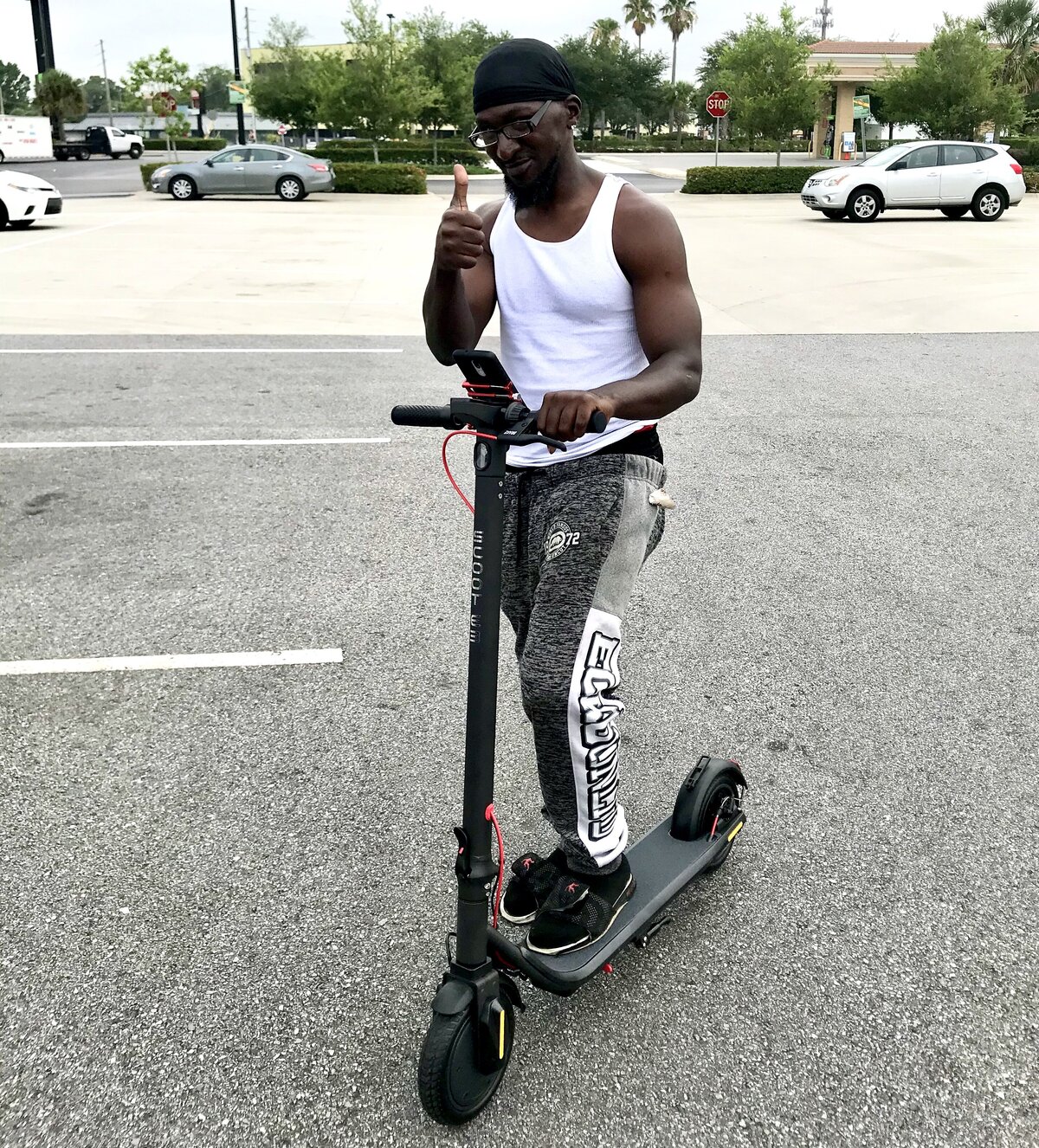 V&D Electric Bikes- Guy on Scoot E-3