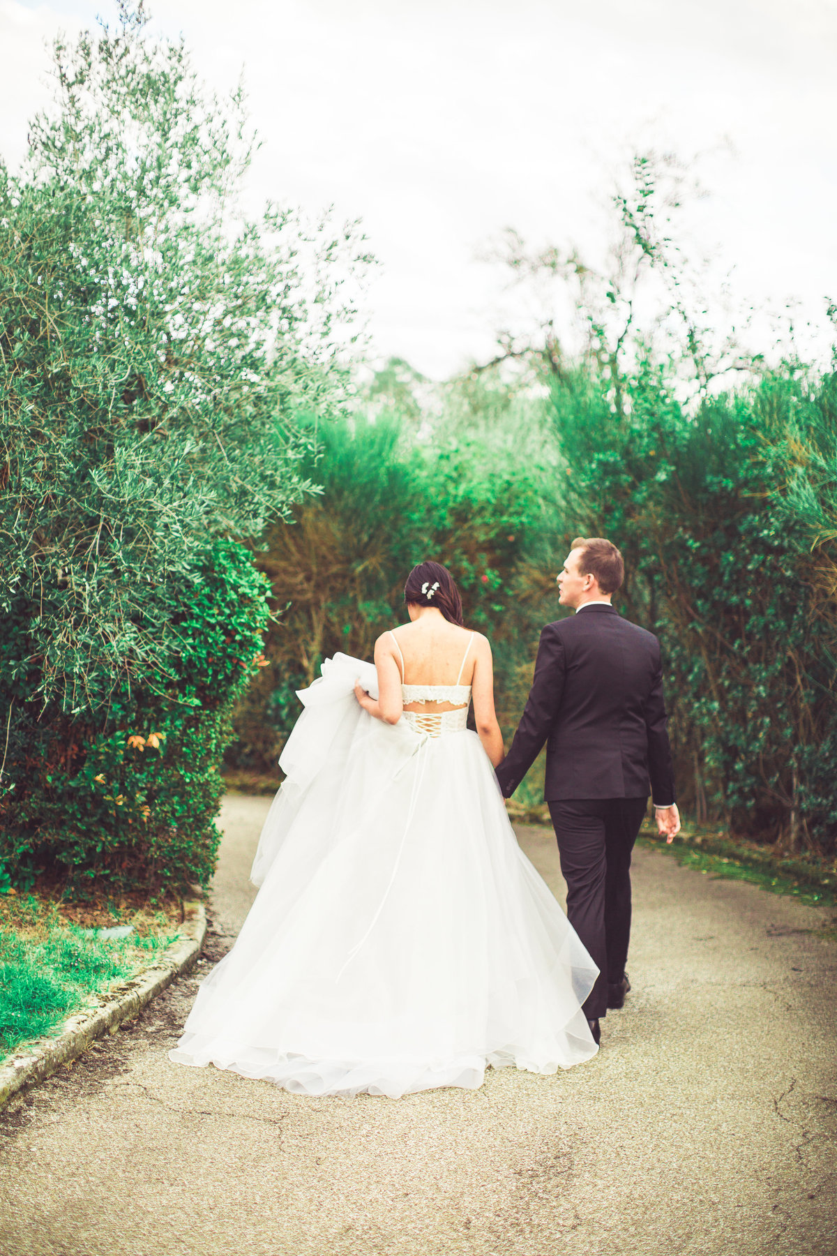 Bridge and Groom Facing Away From Camera