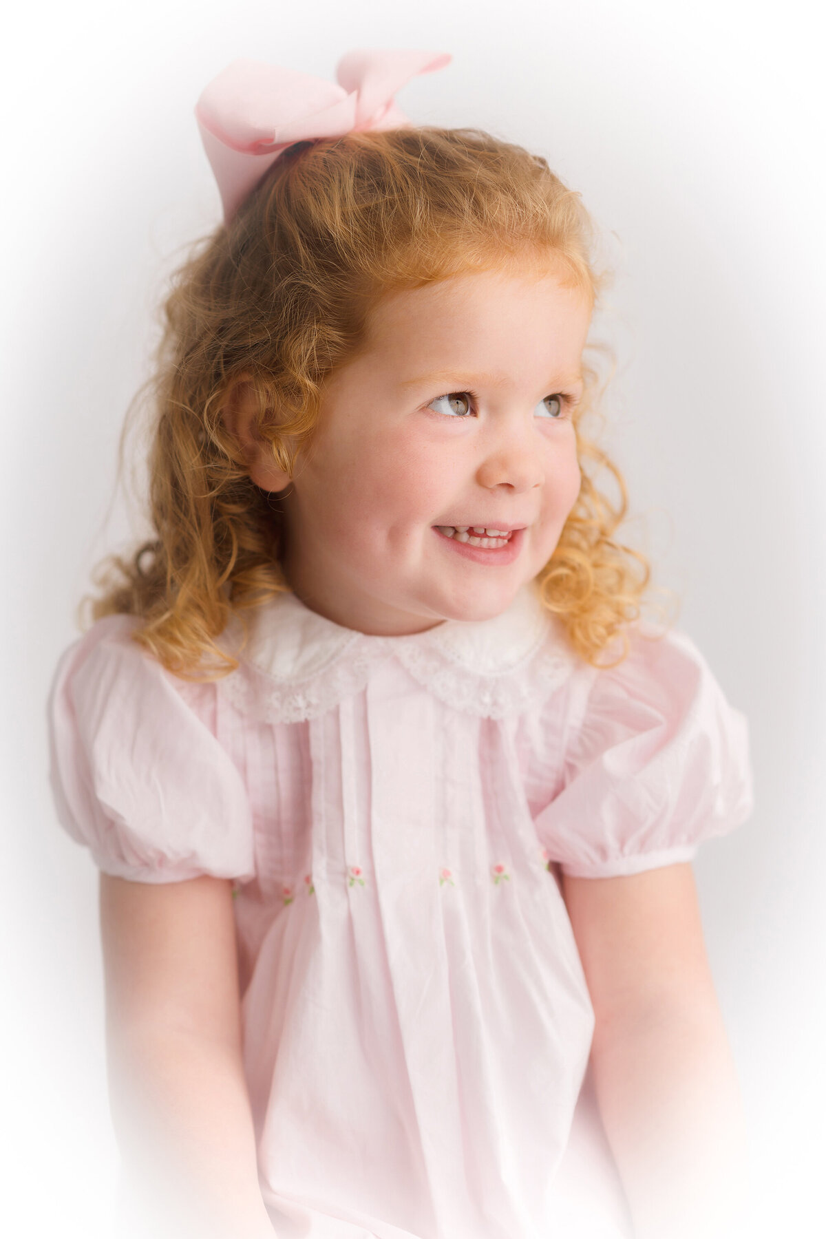 Little girl poses for Heirloom Photoshoot in Charleston, SC.