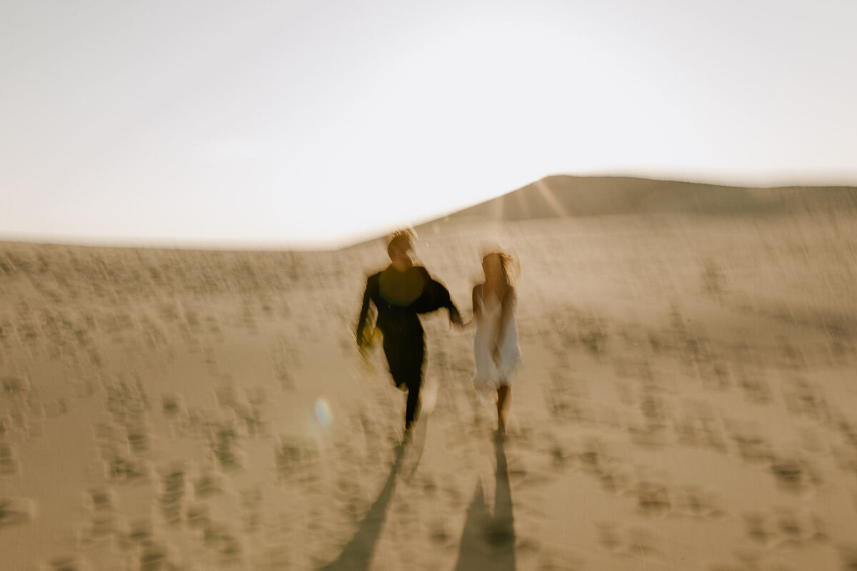 An adventurous elopement at Silver Lake Sand Dunes in Mears. 