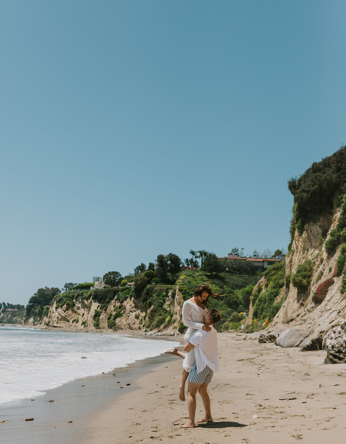 Bride and groom in scenic landscape, Indiana outdoor wedding portrait.