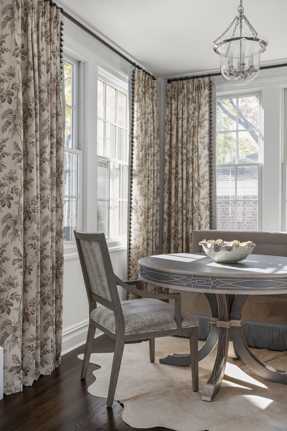 candra lynn interiors ocean port project breakfast nook with large windoes and long curtains