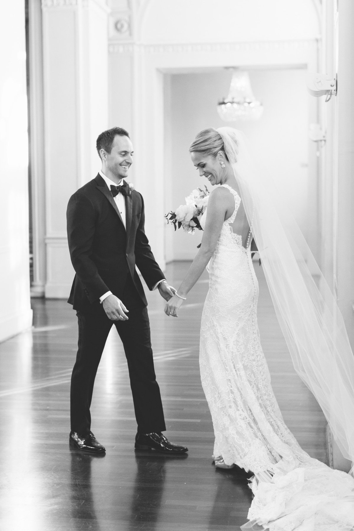 All the joy as this groom sees his bride at their first look in the Georgian ballroom at the Biltmore Atlanta.  Photo by Rebecca Cerasani.