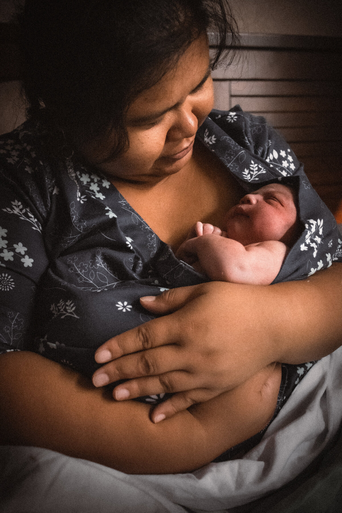 homebirth mother holding newborn baby