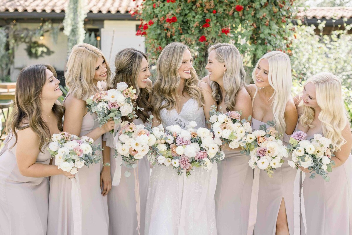 wedding party holding bouquets
