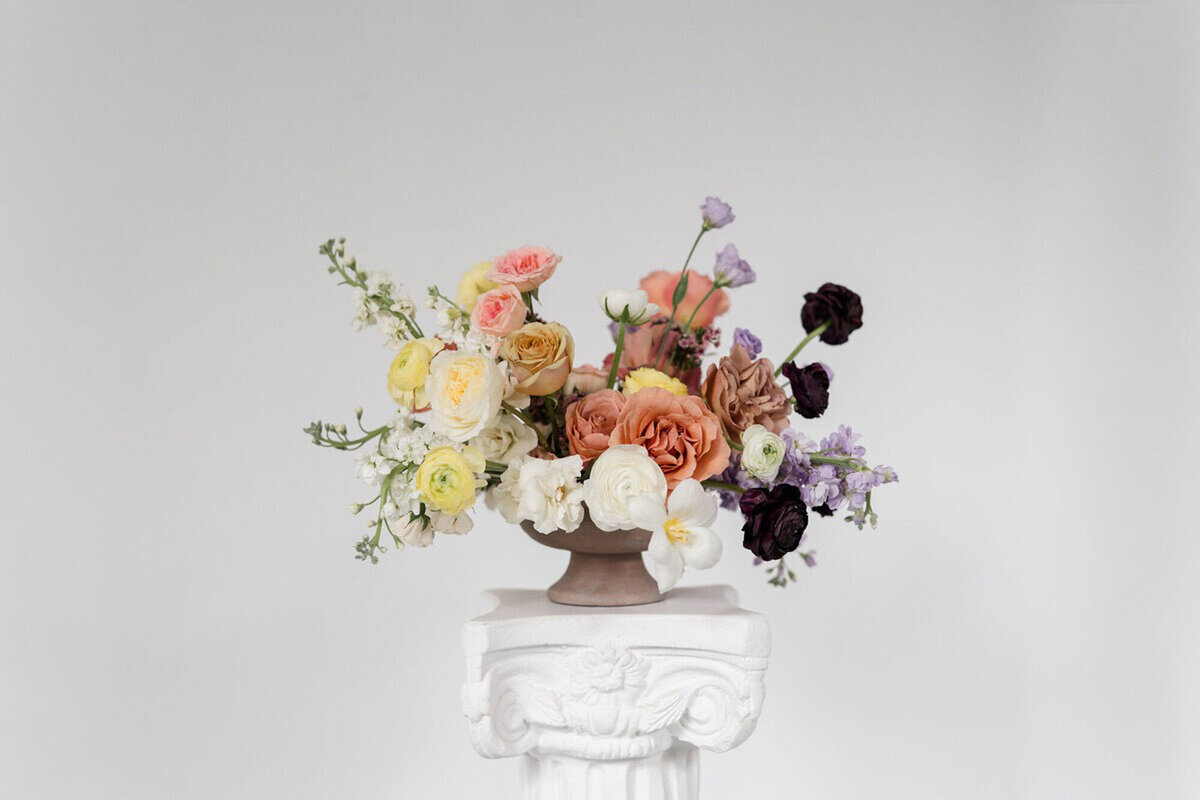 Flower arrangement for wedding captured by Detroit, MI wedding photographer​