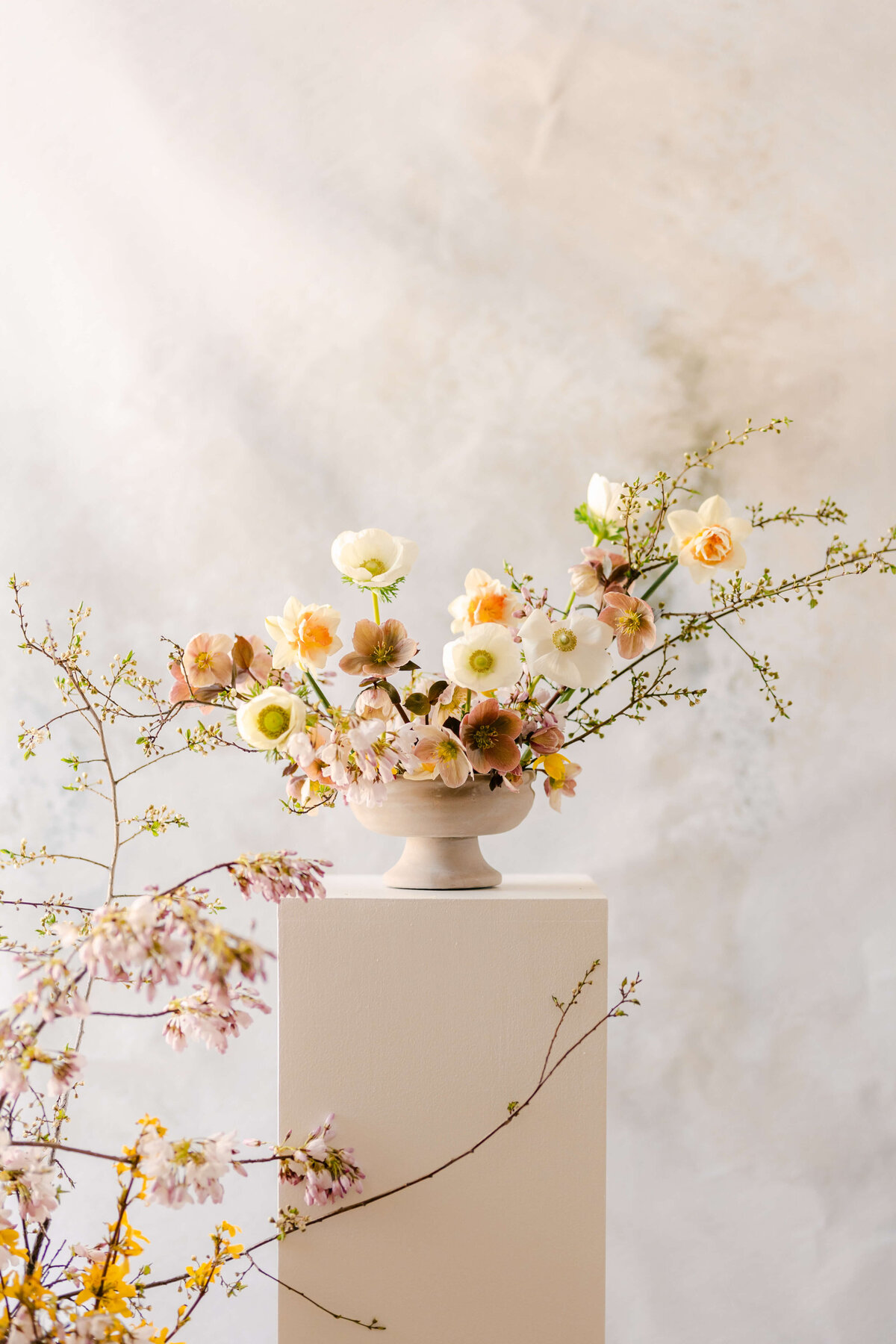 flower centerpiece on pedestal