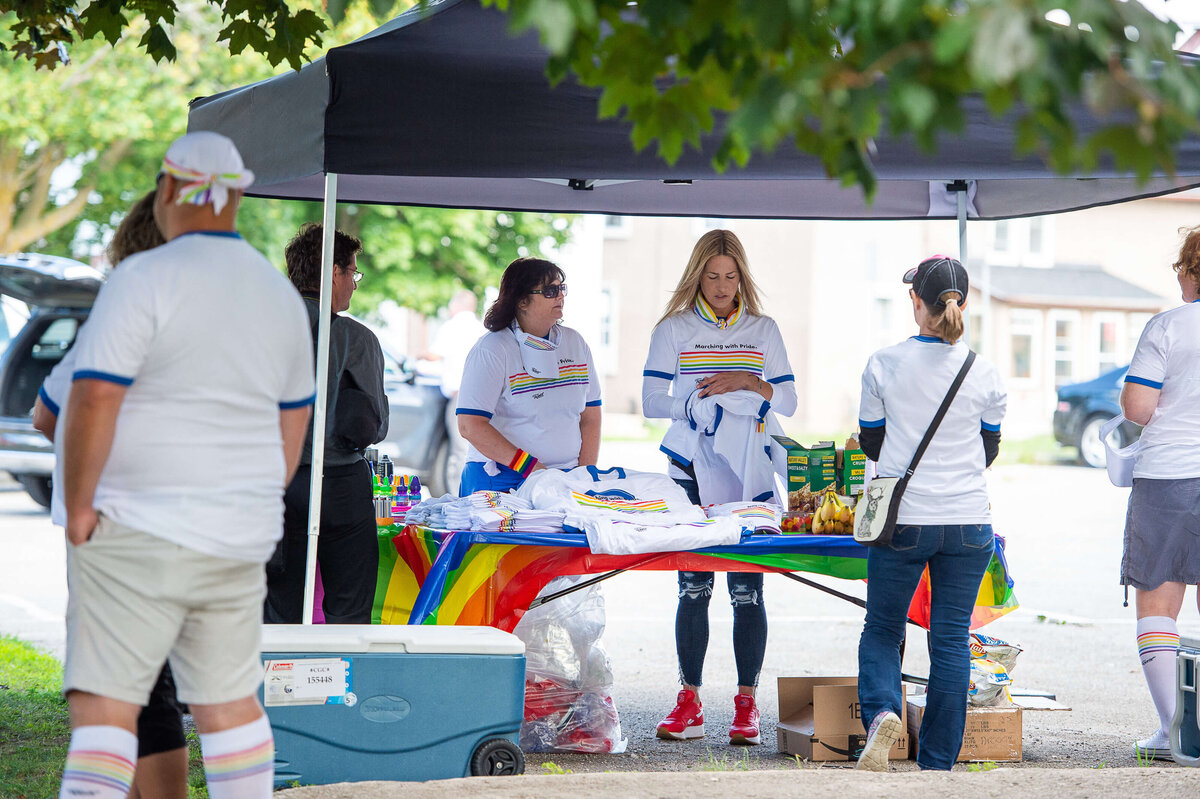 Ottawa event photography showing the registration table at the Tweed Canopy Growth pride parade.  Captured by JEMMAN Photography COMMERCIAL