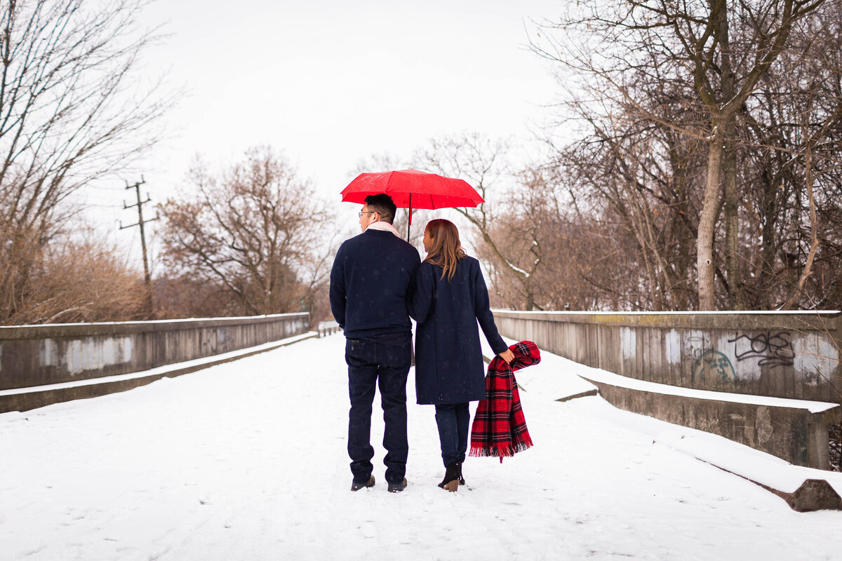 BrianLorenaEngagement12bridgeumbrella-1