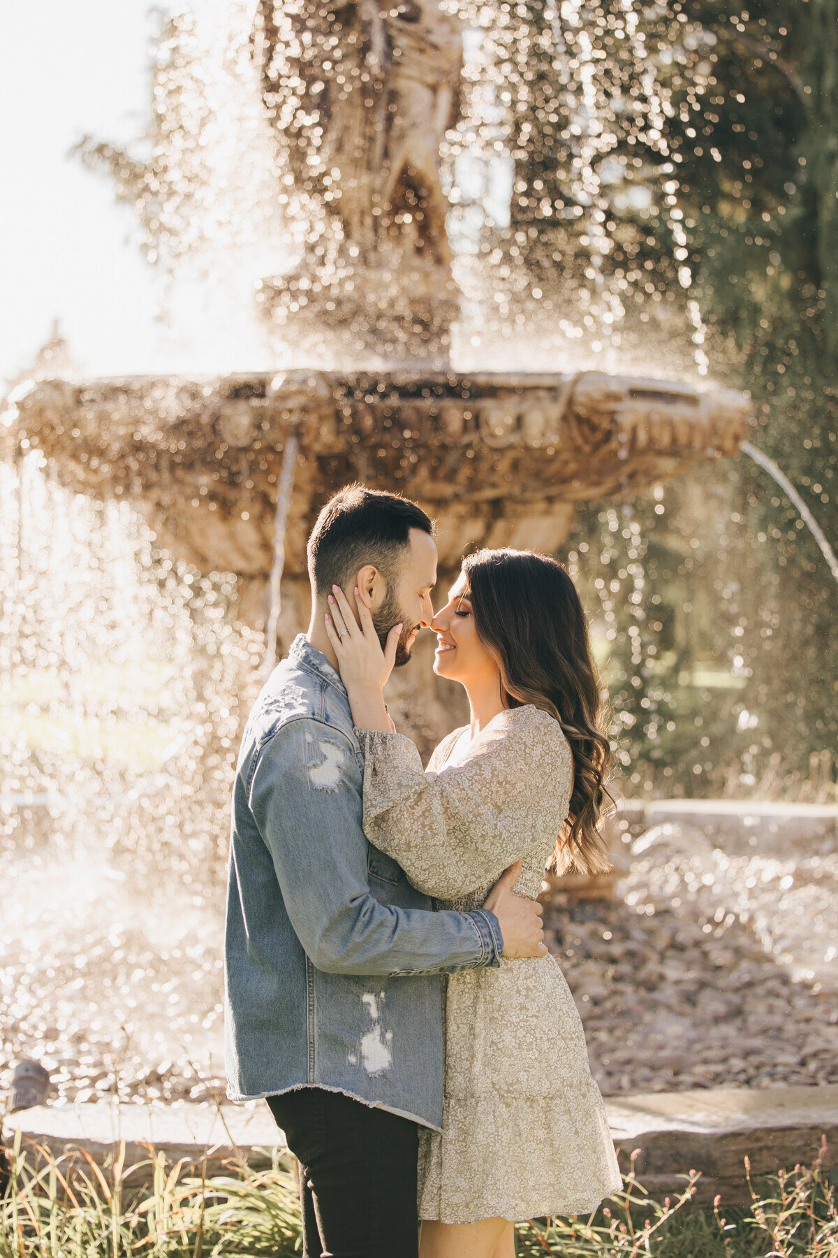 Couple posing for photos at their Elm Hurst Engagement Session by NovaMarkina Photography