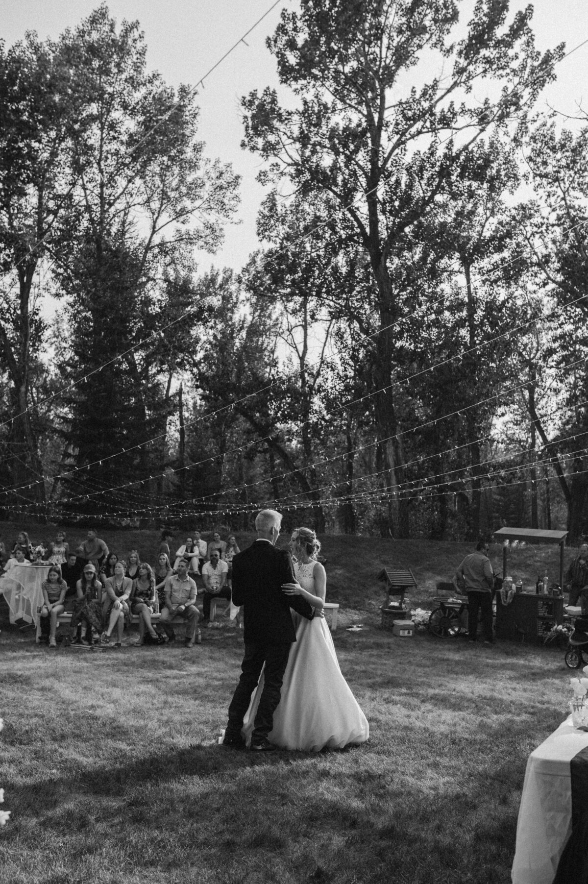 father daughter first dance at alberta backyard wedding