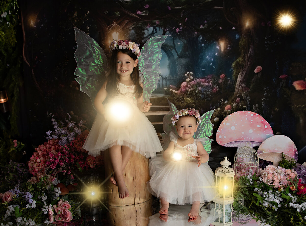 sisters in glowing magical enchanted fairy custom set by san antonio photographer 