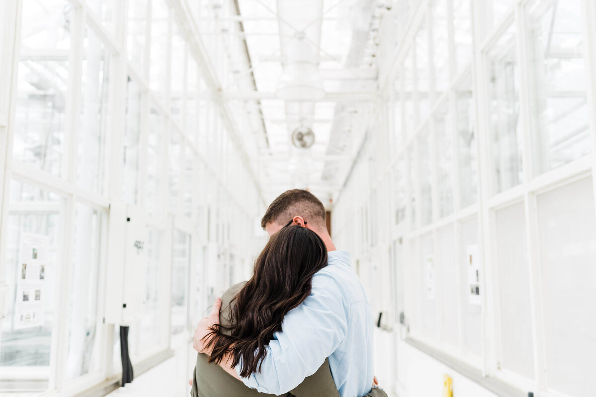 Couple holding each other downtown Halifax.