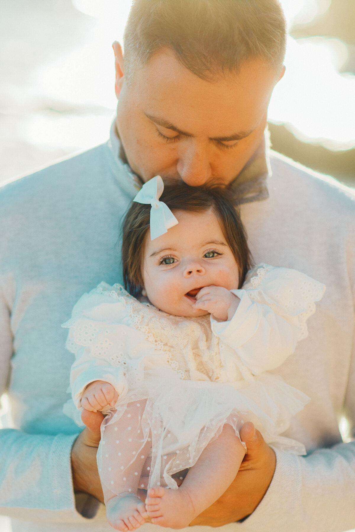 Family Portrait Photo Of Father And Baby In White Outfit Los Angeles
