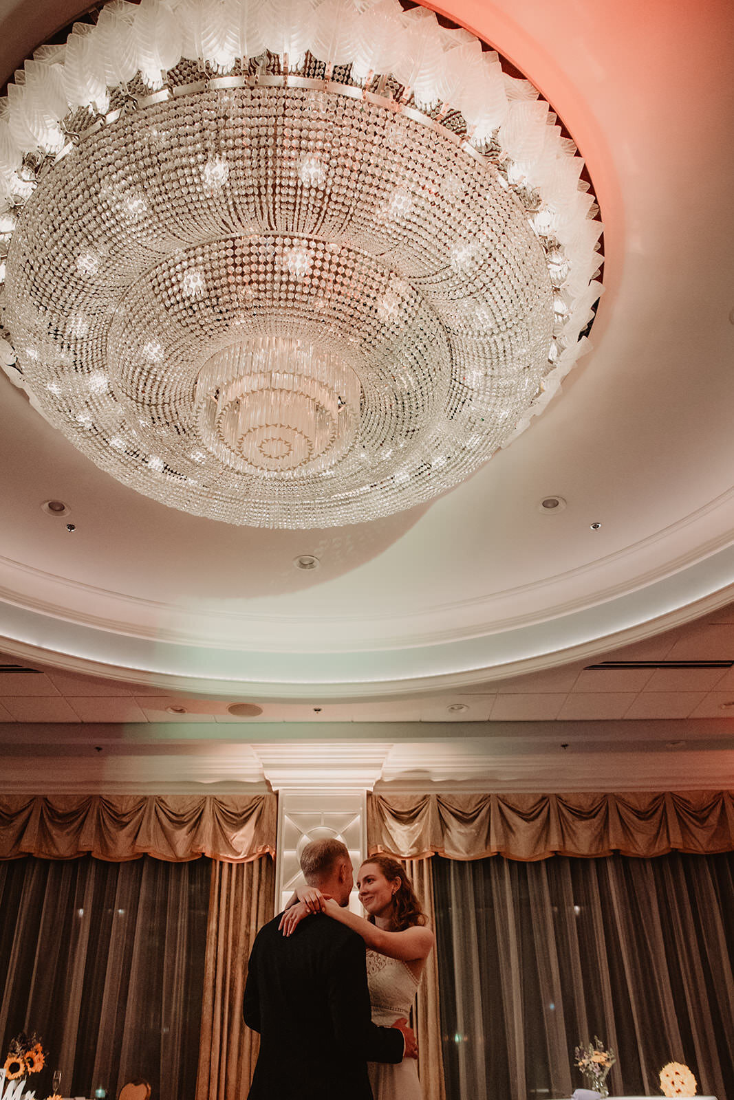 A couple dancing during their wedding reception 