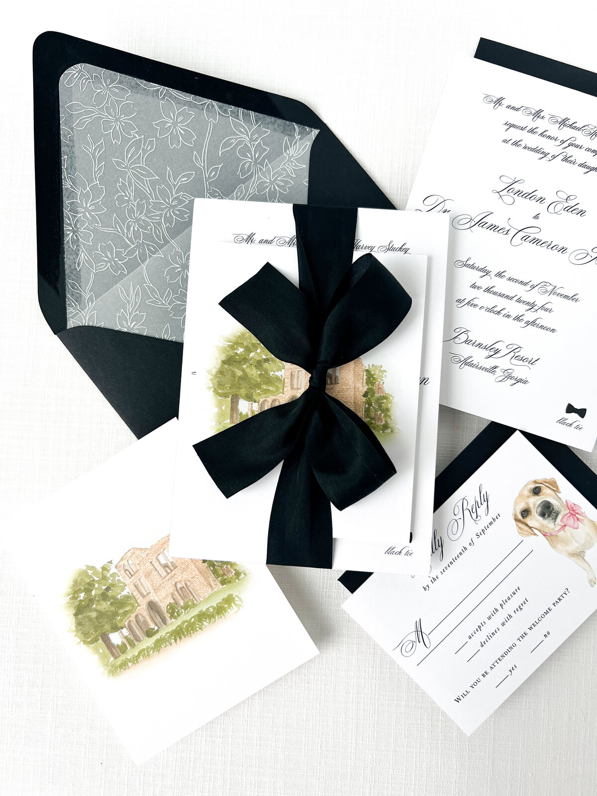 black and white stationery embellished with custom venue and pet portrait paintings