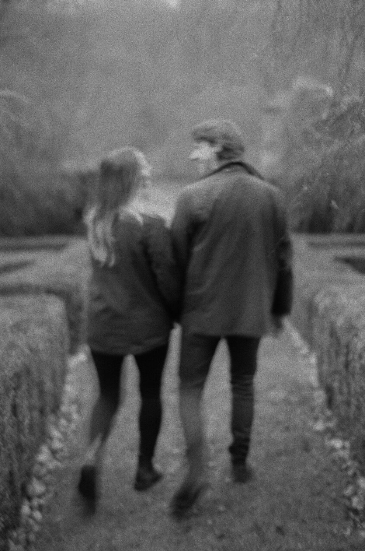 Engagement portraits in Castle Combe, Cotswolds captured on 35mm film