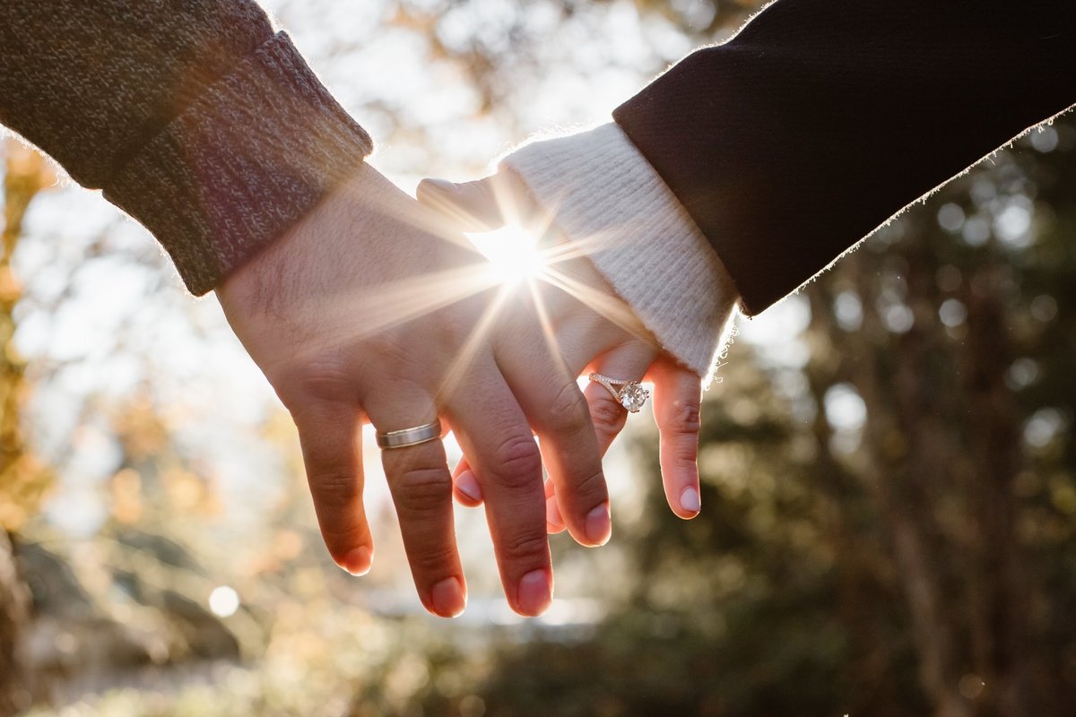 Couple Holding Hands for Adventure Elopement Wedding photographer