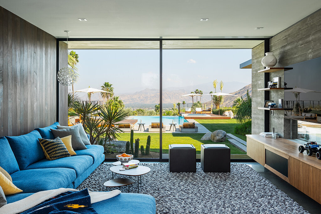 Play room with expansive views of Palm Springs mountains and infinity edge pool in Palm Springs.