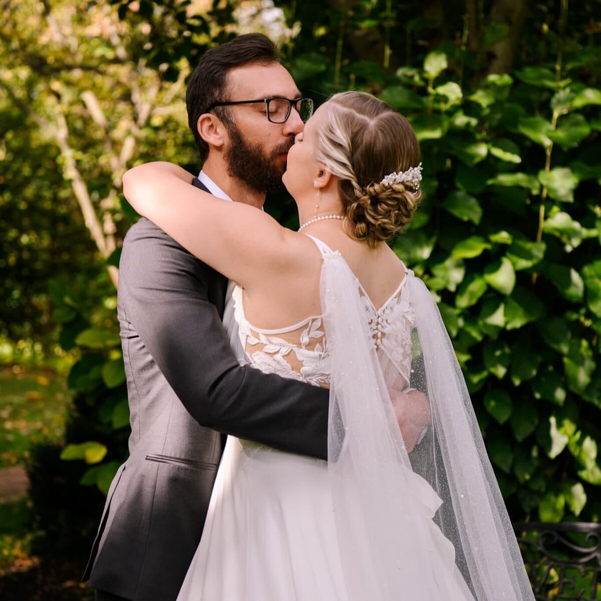 Bride and Groom kiss during outdoor wedding in Northern VA