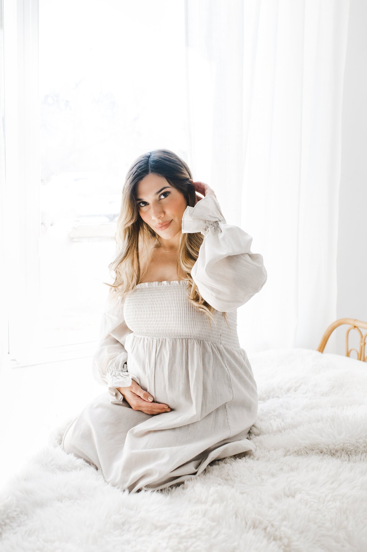 modern simply maternity session, pregnant mama on bed in gorgeous natural light
