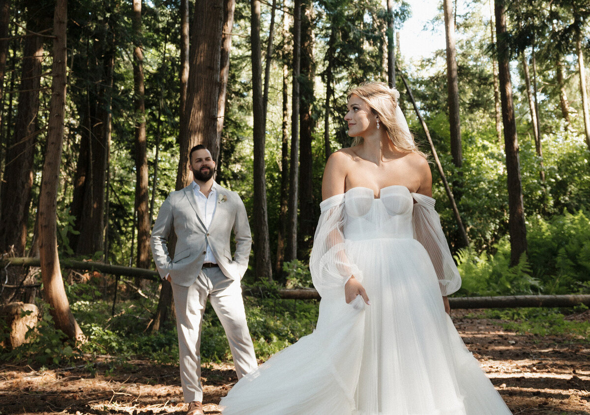 married couple at forest wedding