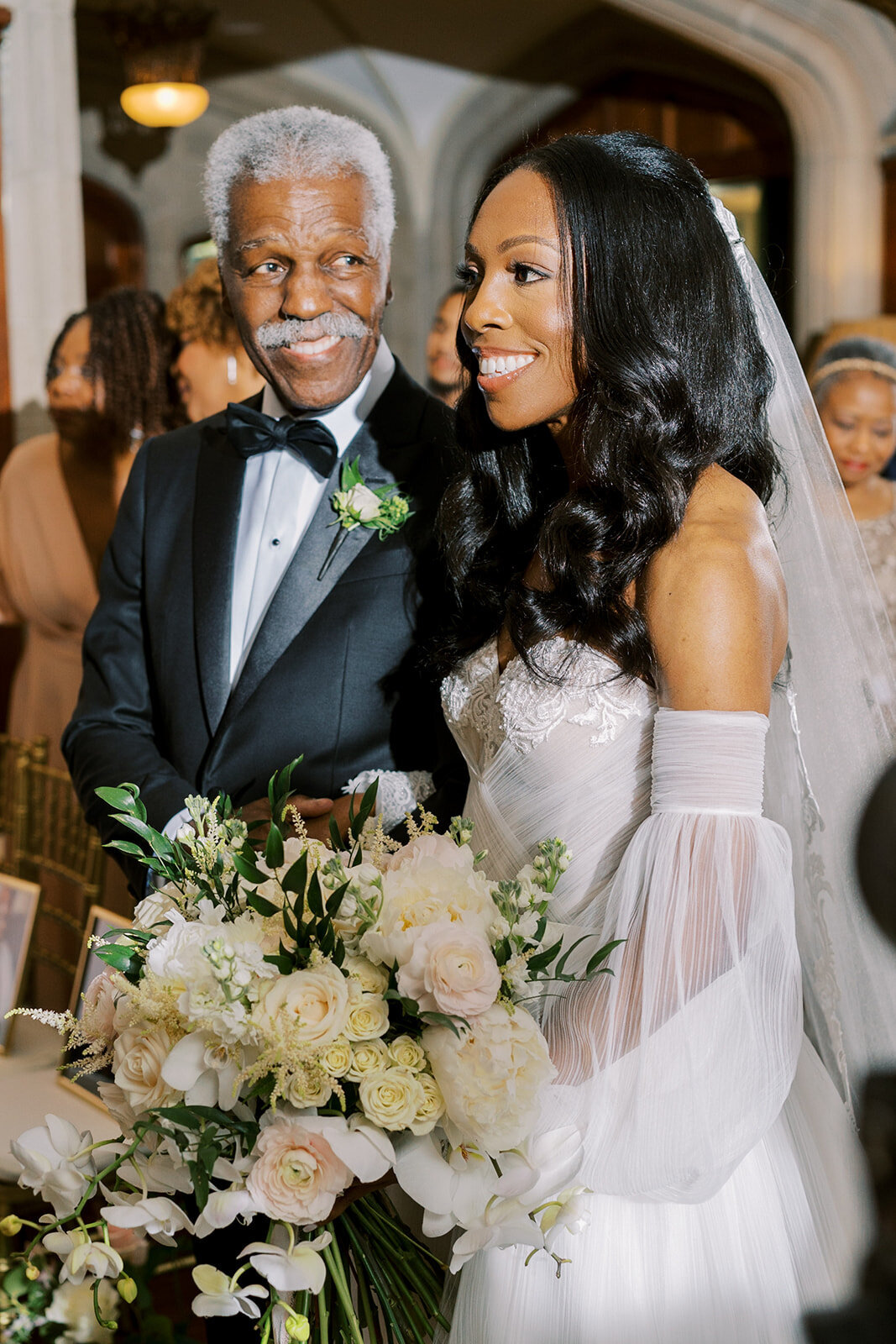 father-gazing-at-daughter-as-she-looks-at-groom-as-she-walks-down-the-aisle-at-callanwolde-atlanta-elizabeth-austin-photography.jpg