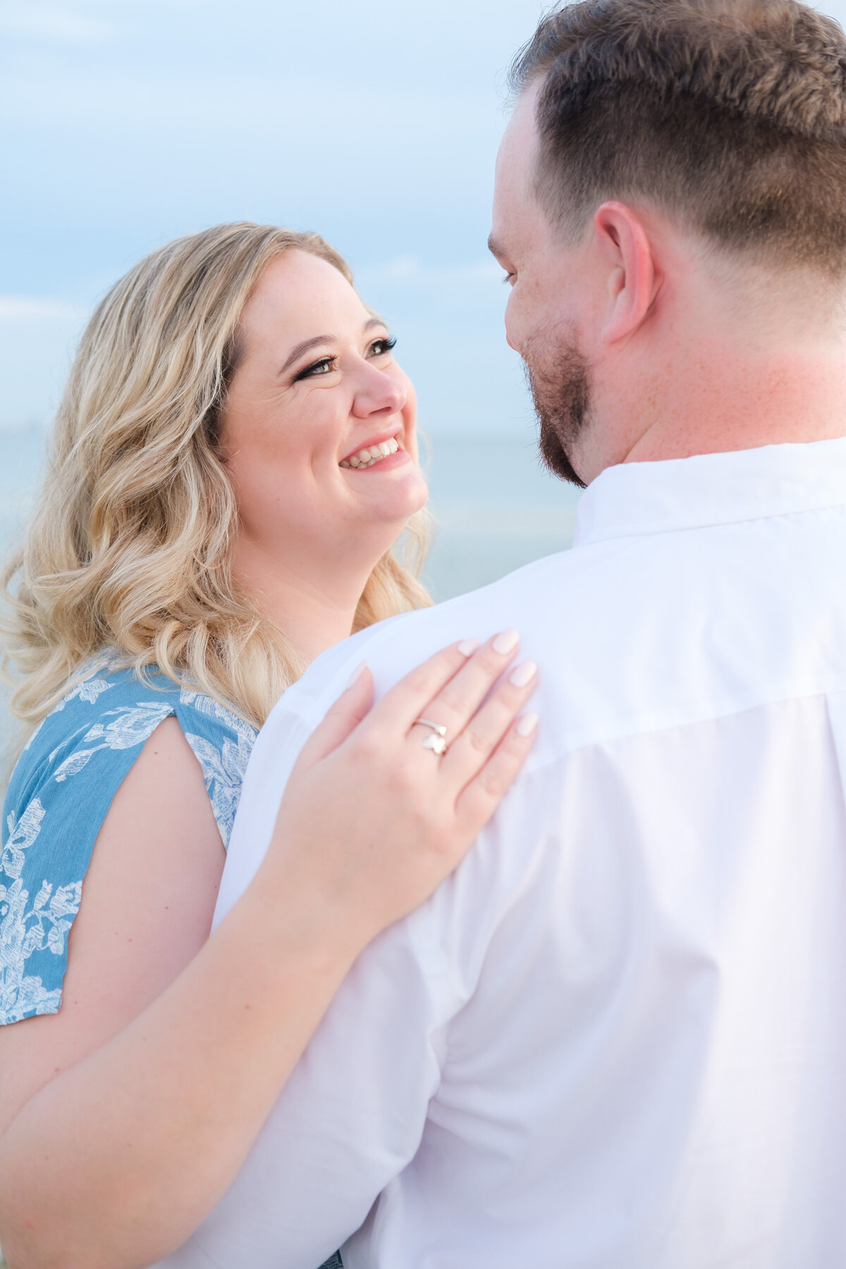 A genuine smile during an engagement session on Honeymoon Island