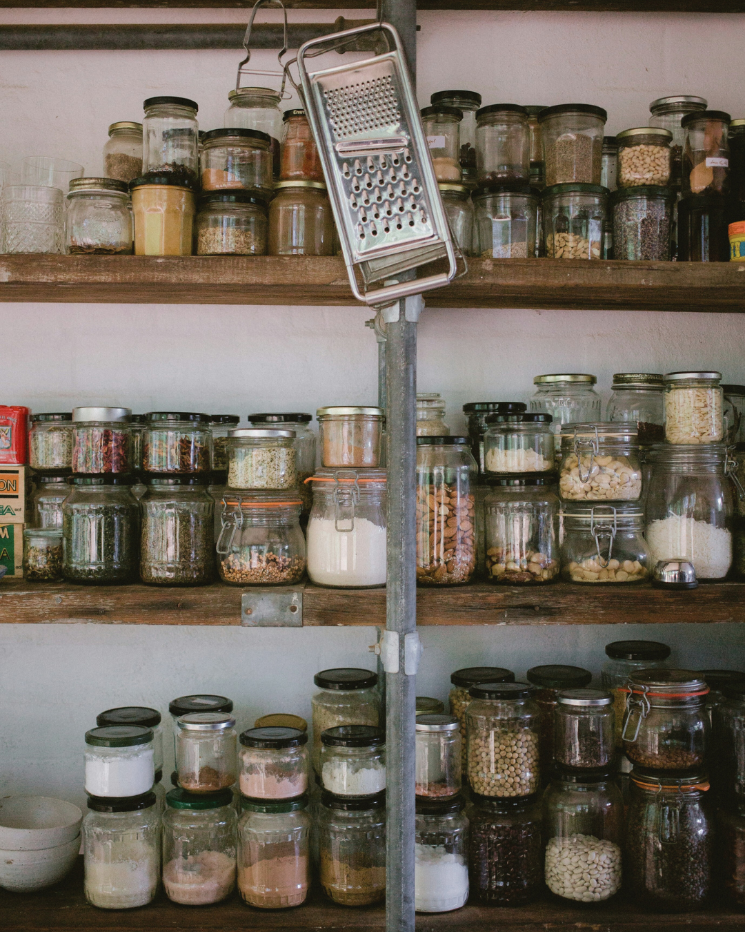 pantry shelves with glass jars