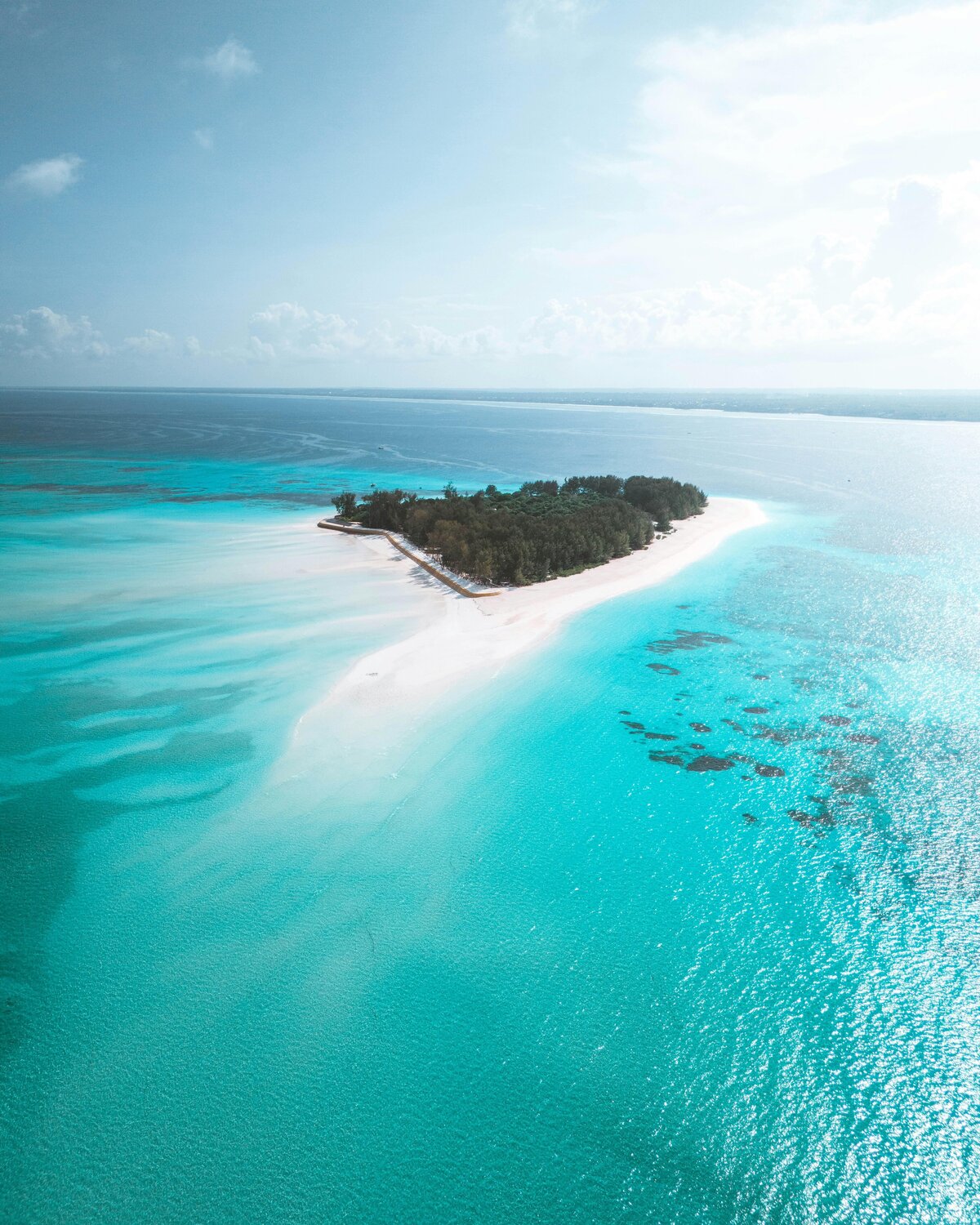Small island in Tanzania in the middle of the blue ocean